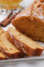 Closeup shot of sliced sweet potato bread with icing.