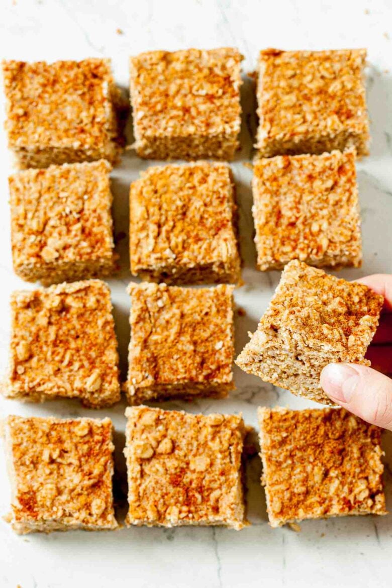 Overhead shot of 12 apple oatmeal bars.