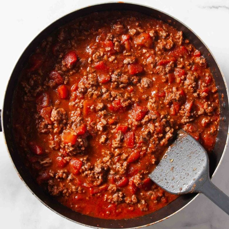 Ravioli Casserole ground meat browning in pan.