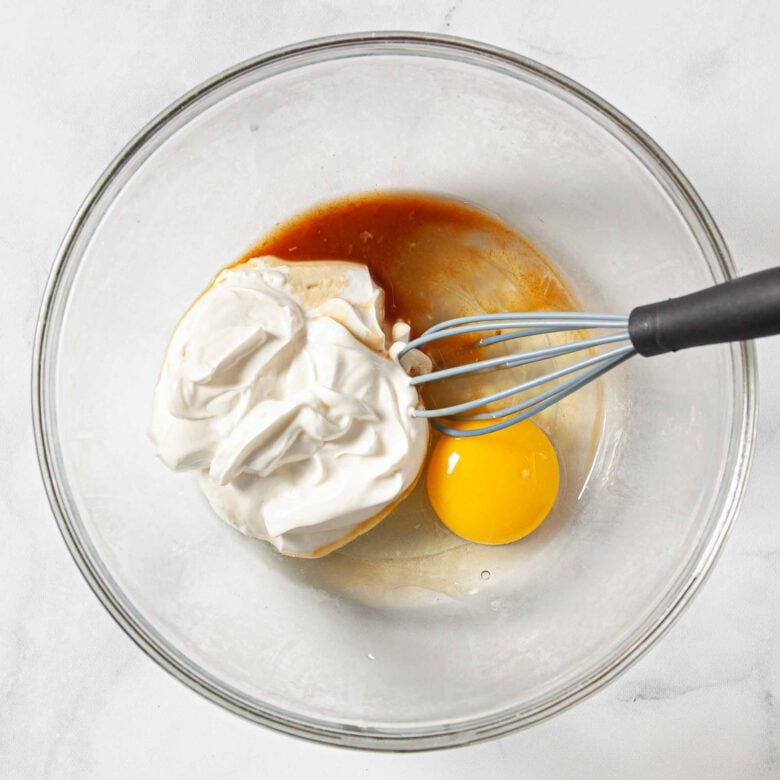 Wet ingredients to make scones in a bowl.
