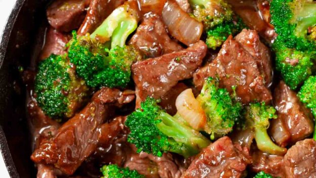 Overhead shot of beef and broccoli stir fry in a pan.