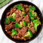Overhead shot of a pan with homemade healthy beef and broccoli stir fry.