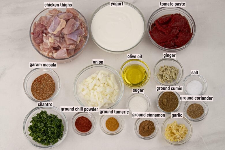 Overhead shot of ingredients to make slow cooker chicken tikka masala.