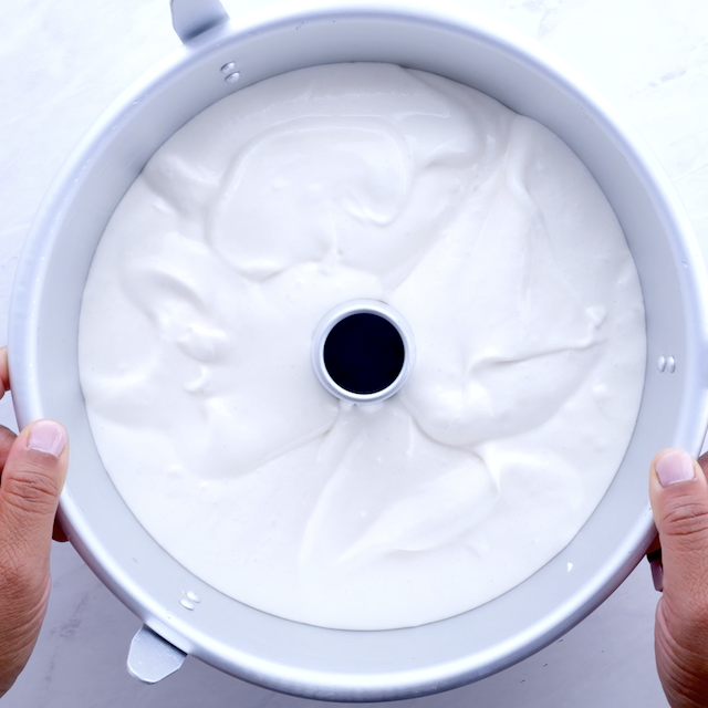 Angel food cake batter in an angel food cake pan.