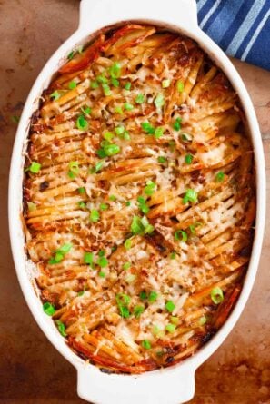 Overhead shot of hasselback potatoes in a casserole dish.