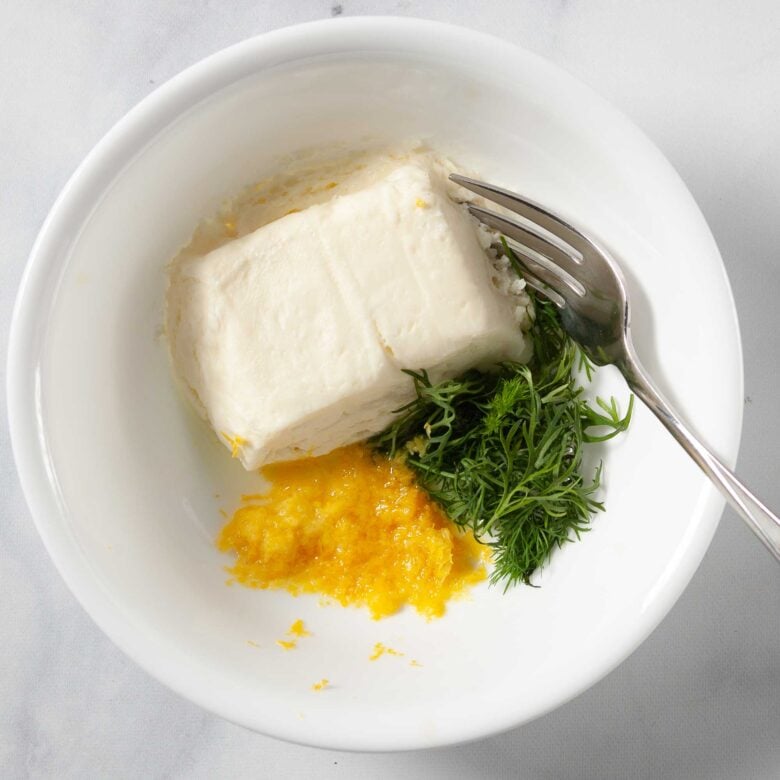 Cucumber sandwiches showing how to make the cream cheese spread, with lemon and dill.
