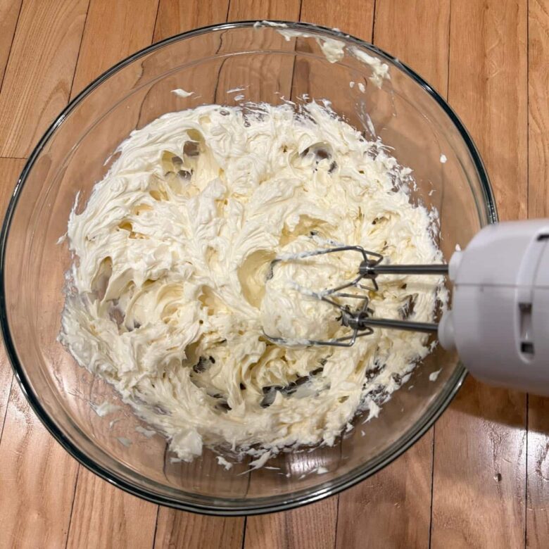 cream cheese frosting being mixed.