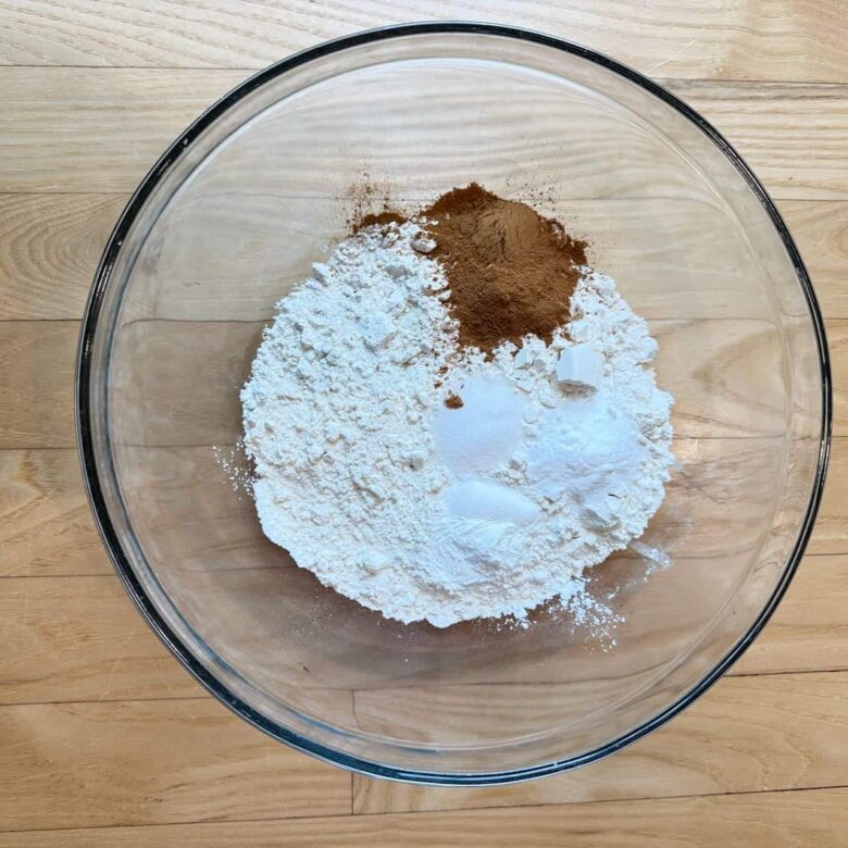 Carrot cake dry ingredients mixed in a bowl.