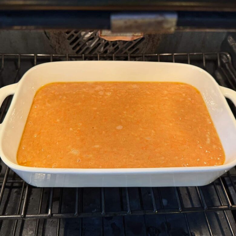 carrot cake batter in oven.