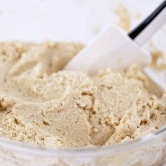 Peanut butter sandwich cookie dough in a glass bowl.
