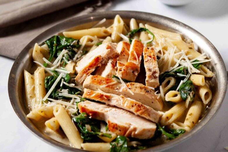 Chicken florentine pasta in a bowl, ready to serve.