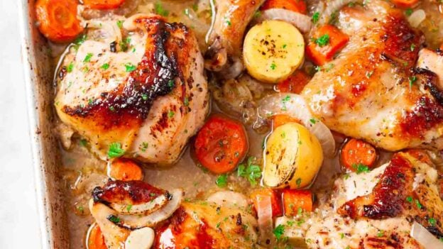 Overhead shot of sheet pan chicken and potatoes.