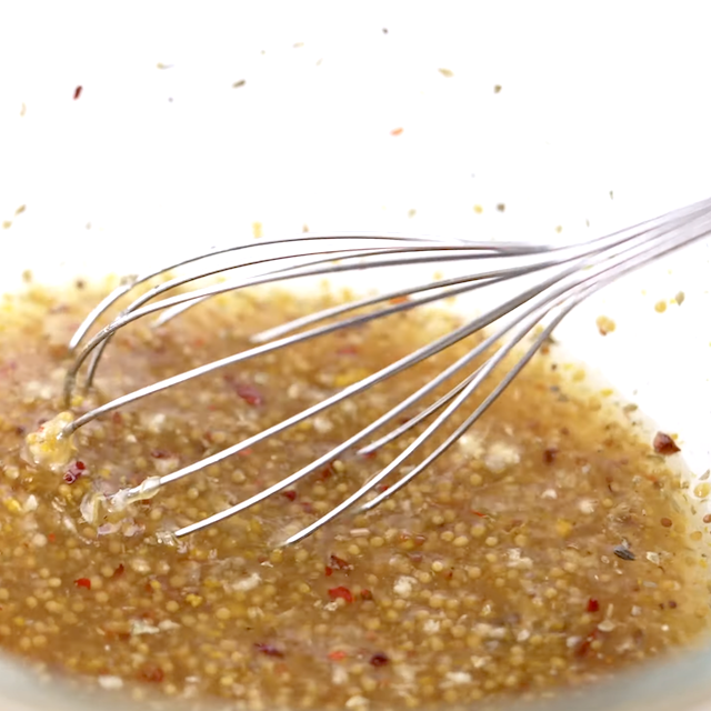 Marinade being whisked in a bowl.