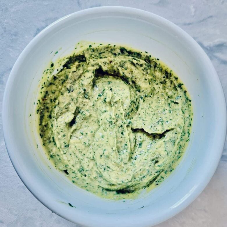 Creamy sauce for avocado pasta in a bowl.