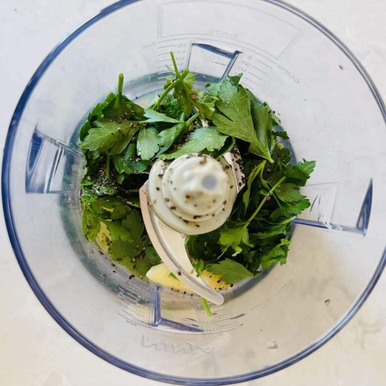 Ingredients for Avocado Pasta combined in a food processor.