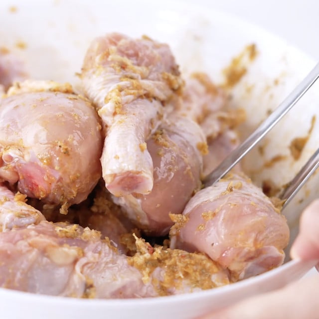 Lemon garlic chicken marinade in a bowl.