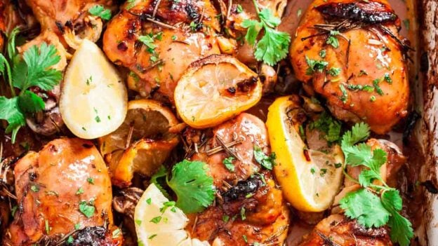 Overhead shot of lemon garlic chicken in a casserole.