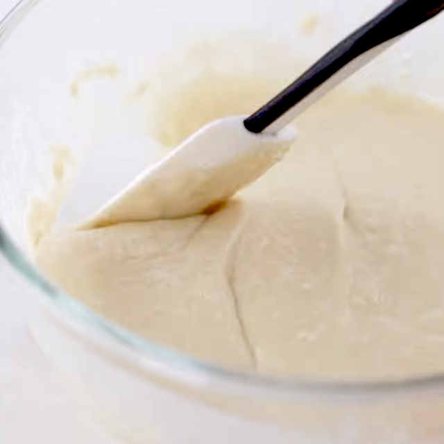 Pancake batter being mixed to make buttermilk pancakes.