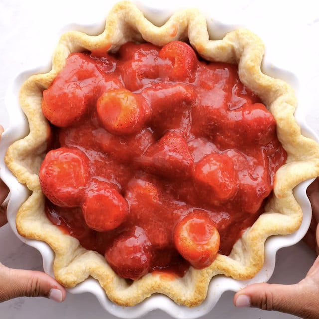 Overhead shot of freshly made strawberry pie.
