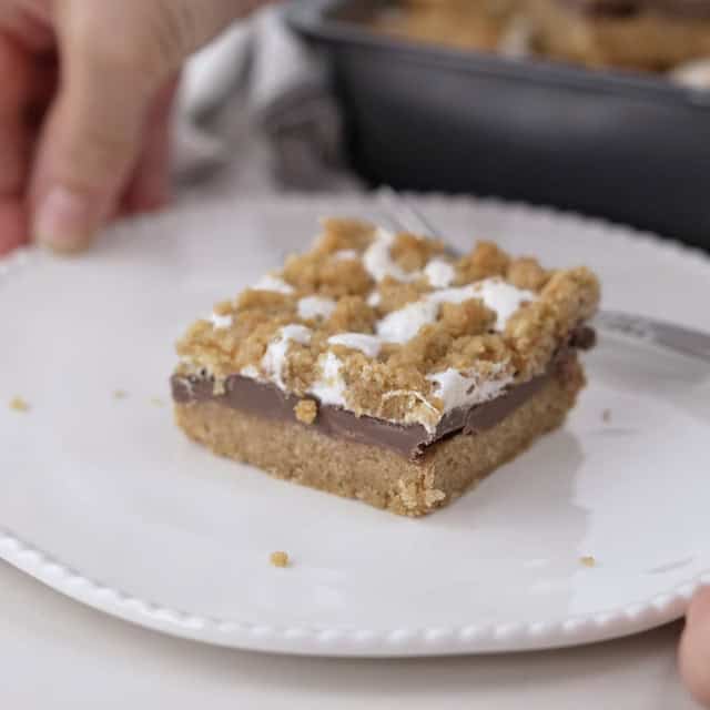A piece of smores bars, ready to serve