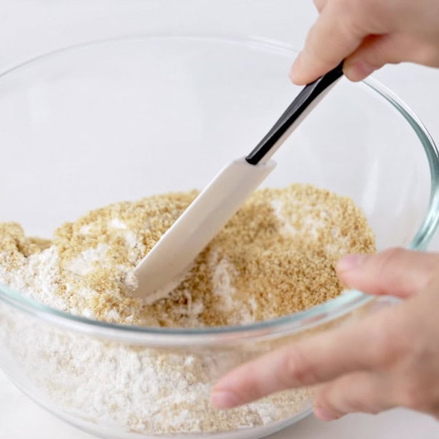 Dry ingredients being mixed to make smores bars recipe.