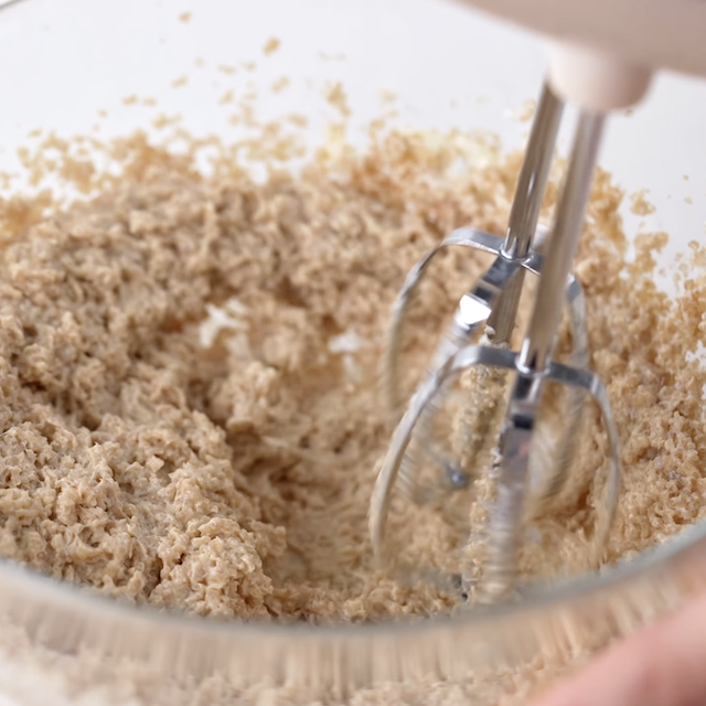 Butter and sugars being beaten together to make smores bars recipe.