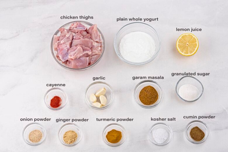 Labeled ingredients to make Butter Chicken Recipe.