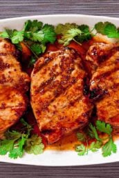 Serving plate with Honey Mustard Pork Chops on it.