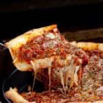 A slice of deep dish pizza.